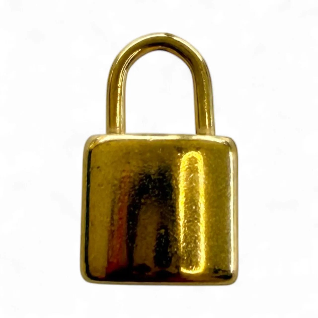 Gold lock charm