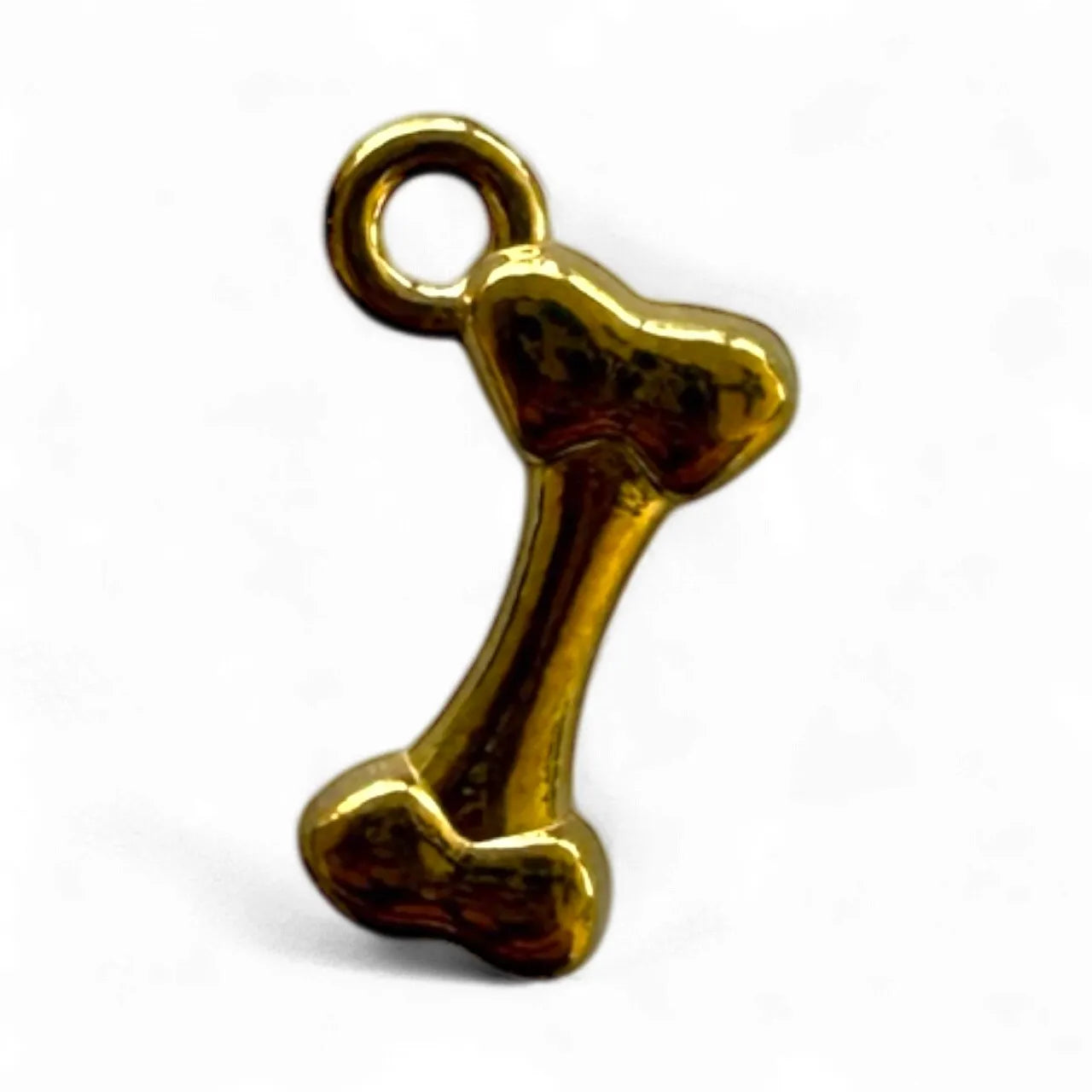 Small gold dog bone charm